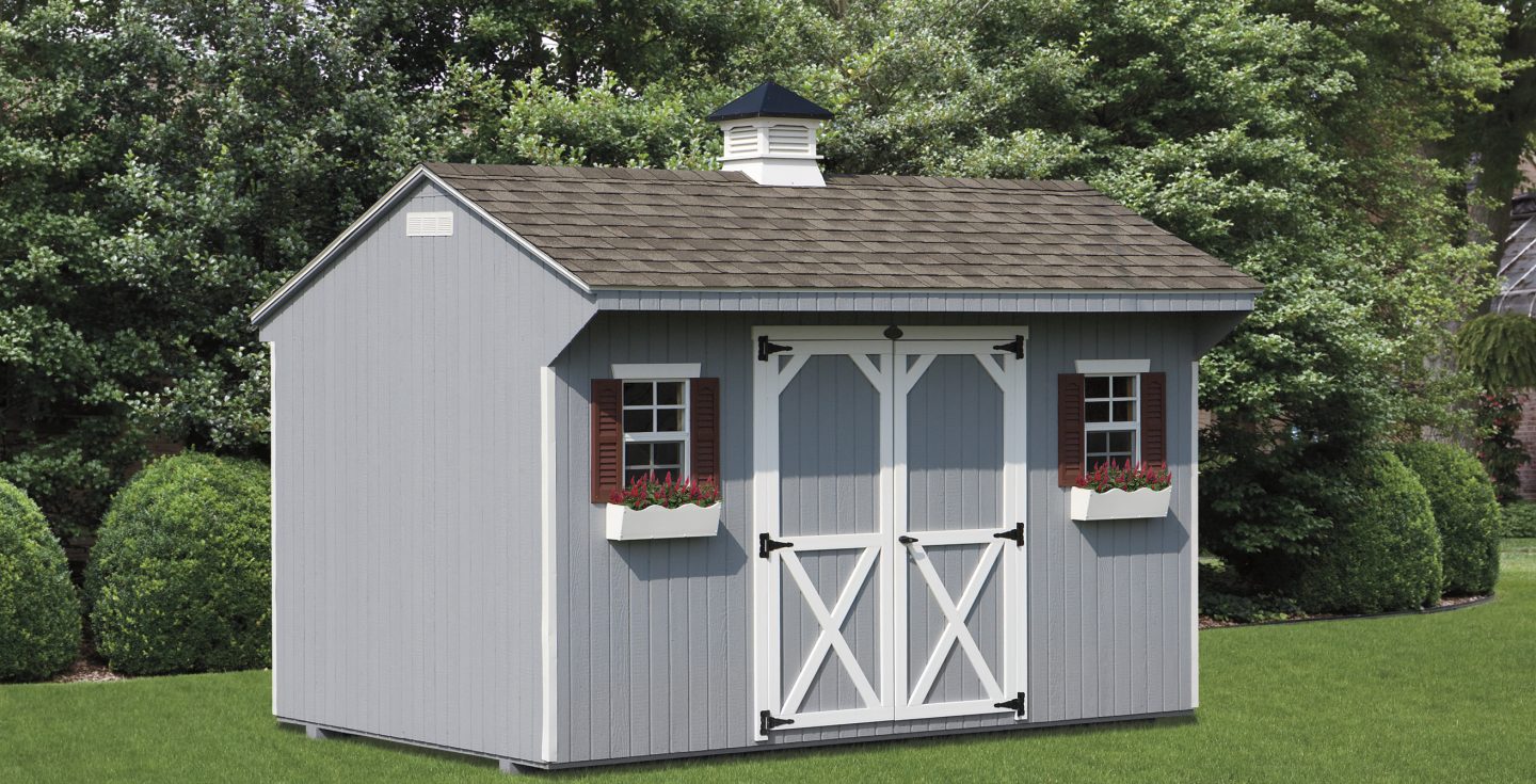 blue vinyl quaker shed with window baskets